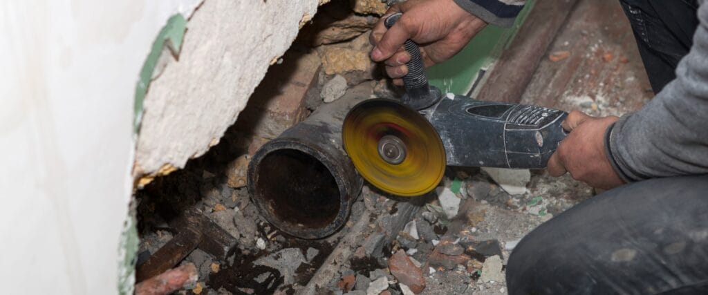 Man Cutting Sewer